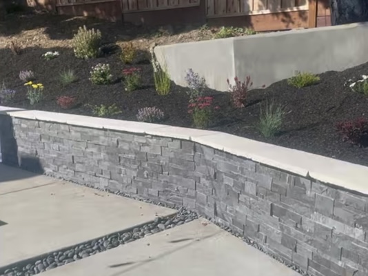 Video of a new retaining wall.