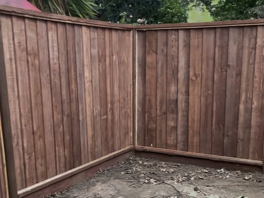 Video of a freshly installed fence with posts and panelling.